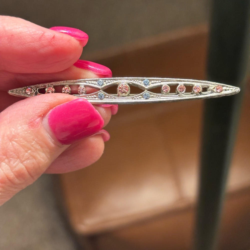 1928 Silver Scrollwork Brooch